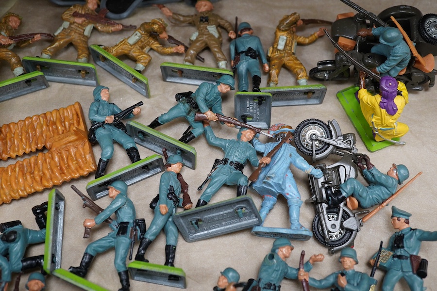 A quantity of Britains plastic soldiers; including Britains Deetail series, including; notes, infantry, native Americans, it Turkish Warriors, archers, WWII soldiers, etc. Condition - good